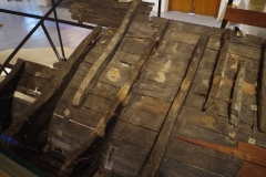 Detail of the Punic shipwreck with visible alphabet notations.