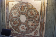 Mosaic depicting chariots and symbols of time. Dated to the 3rd century CE and found in Sainte Columbe.