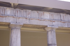Detail of the inscription in the architrave of the east stoa marking the restoration of the stoa by Agathokles, priest of Zeus Ithomatas,  and dedicate to the gods and the city.