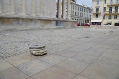 Column bases around the Maison Carrée.