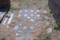 Opus scutulatum pavement from the fauces of the House of Severus at Pompeii.