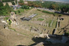 Quadriporticus adjacent to the theater at Volterra; a later bathing complex has been constructed in the open area of the quadriporticus.