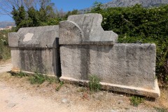 Unadorned sarcophagi along the path east of the 16 sarcophagi outside the walls.