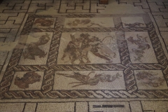 Detail of the central panel of the drunken Hercules mosaic.