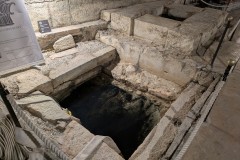 One of the wells in hallway Y dating to before the construction of the palace.