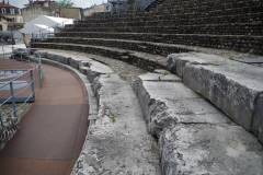 Original stone facing of the seating of the theater.