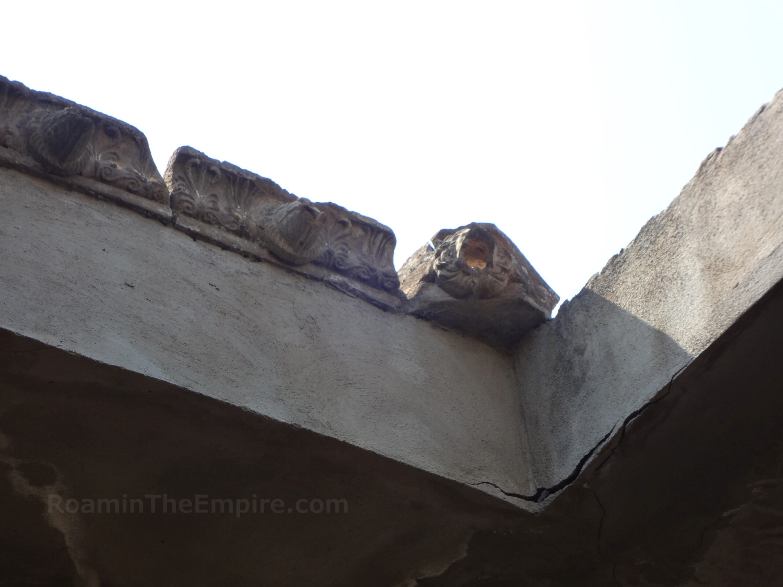 Spout tiles funneling water through the compluvium of the atrium at the Fullonica of Stephanus at Pompeii.