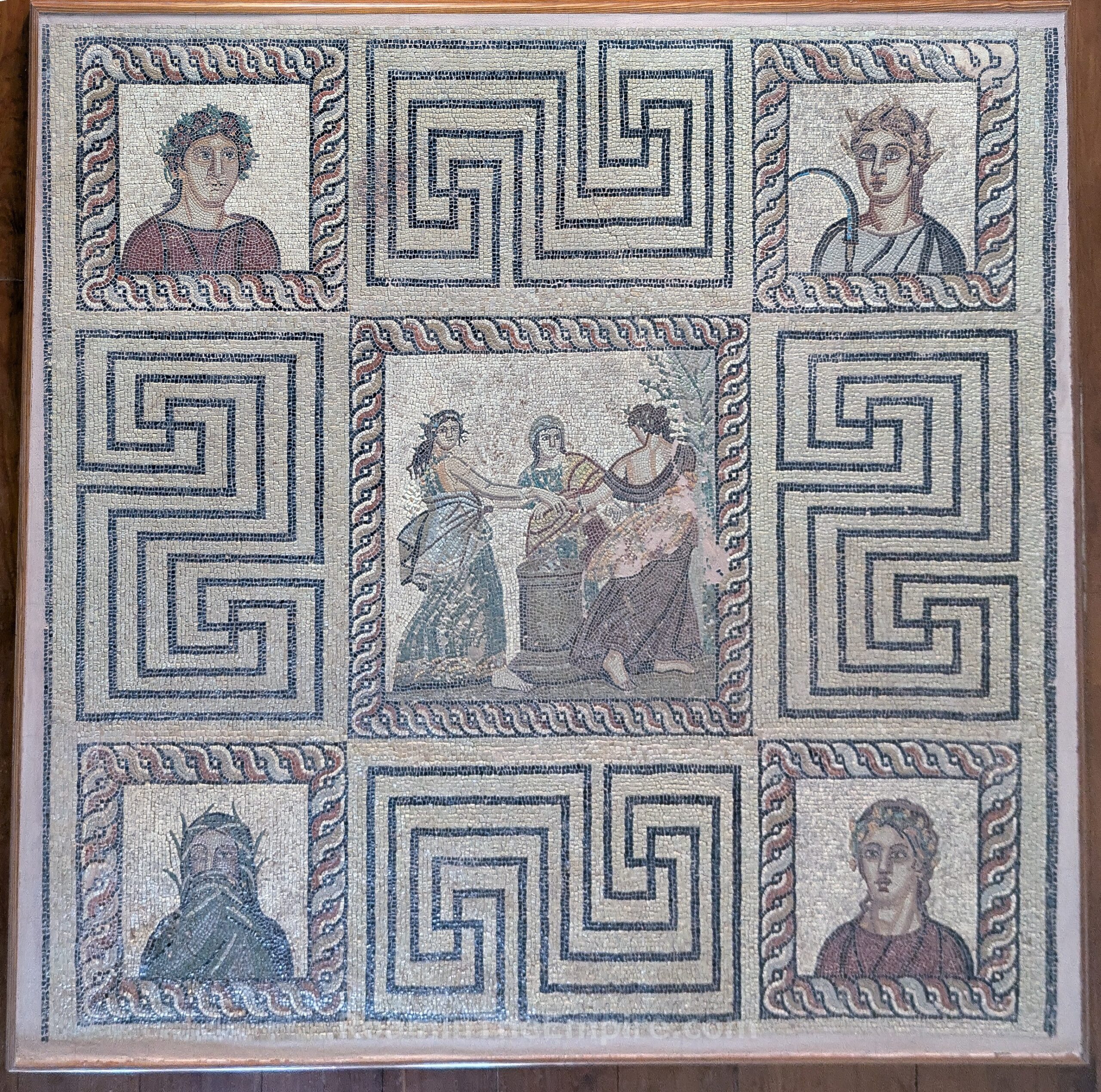 Mosaic depicting the Horae dancing around an altar with images of personifications of the four seasons at the corners. Found locally and dated to the late 2nd century CE. Archaeological Museum of Kissamos. Kisamos.
